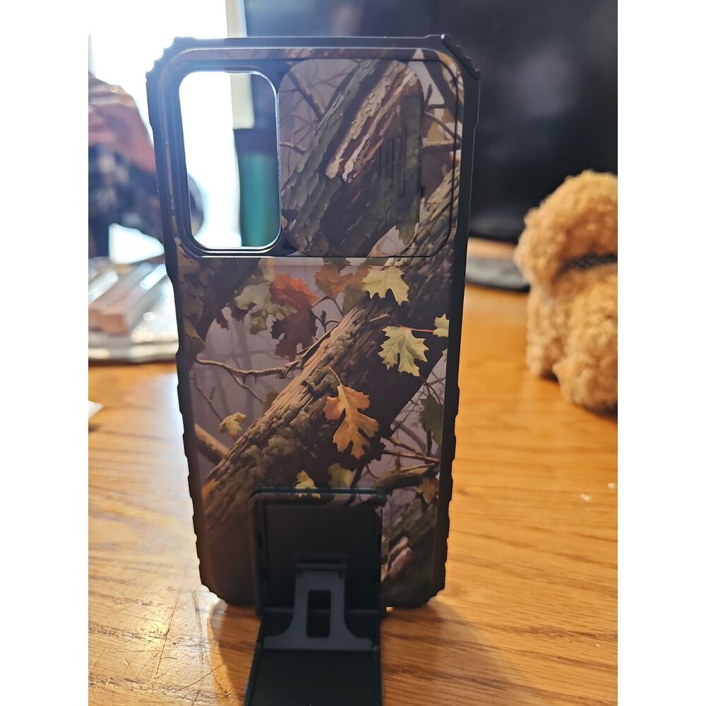 Samsung Galaxy S24–style rugged case with a sliding camera cover + kickstand